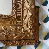 Golden trumeau mirror for fireplace, late 19th century, with sculpted pediment.