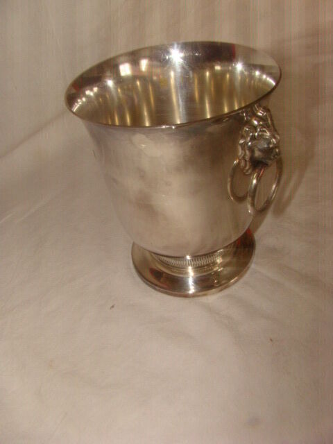 silver-plated ice bucket "with lion heads" from the 1970s