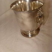 silver-plated ice bucket "with lion heads" from the 1970s