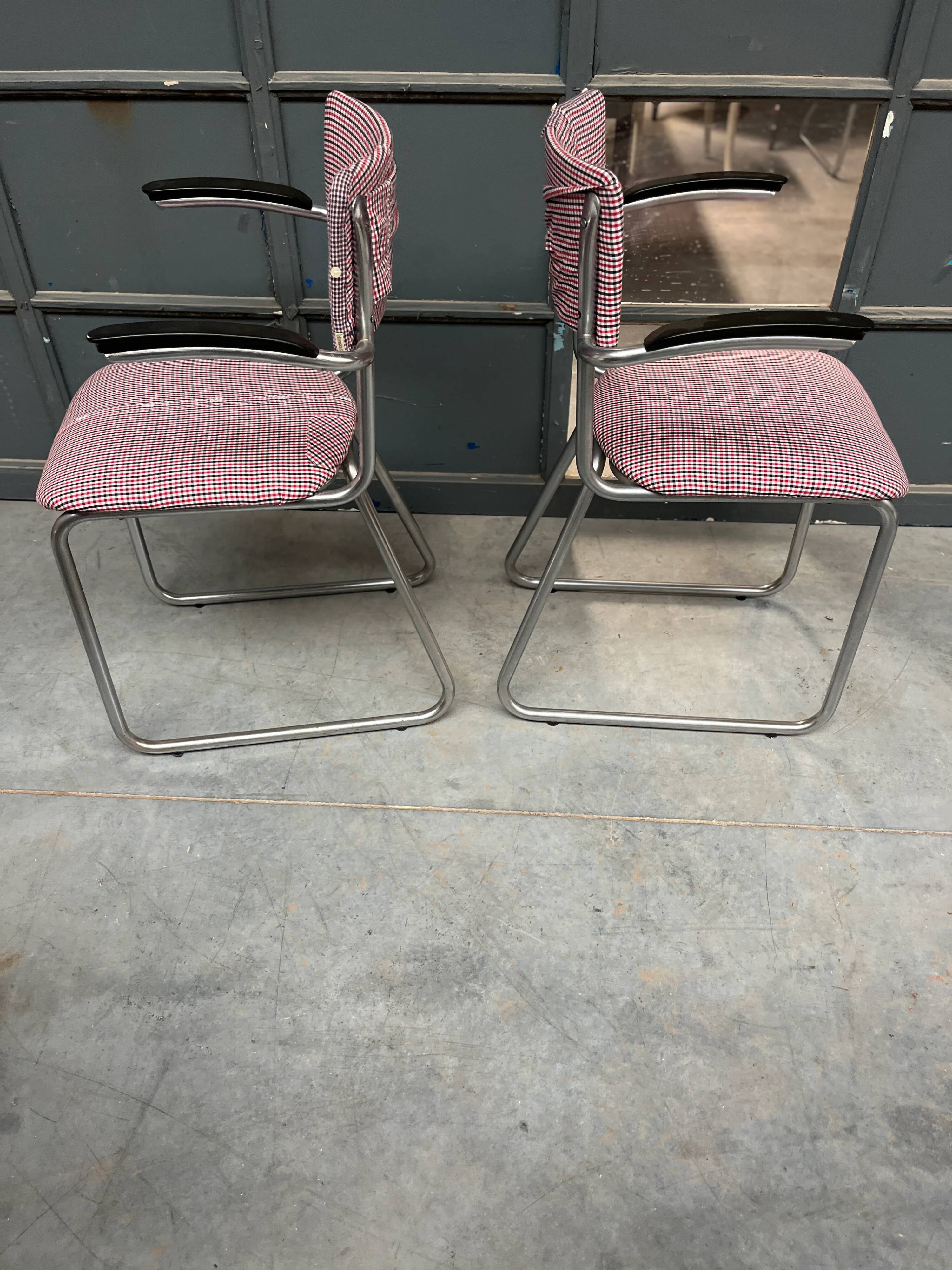 Set of 3 vintage cantilever chairs reupholstered.