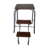 Old retractable wooden stepladder
