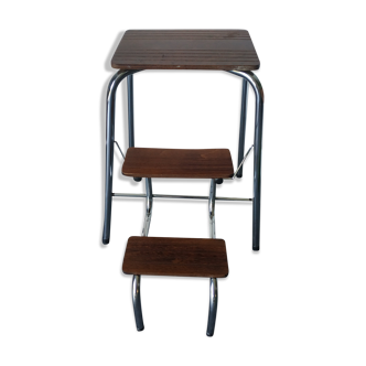 Old retractable wooden stepladder