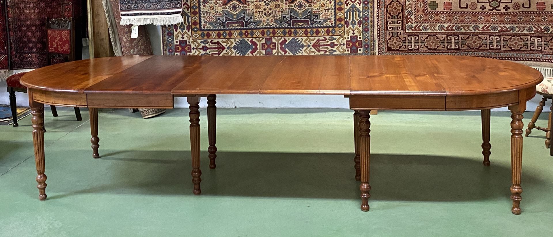 Louis Philippe round table 8 feet in cherry with 6 extensions