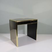 Occasional table or side table in Hollywood Regency style.