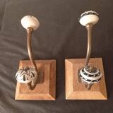 Duo of coat hooks, coat racks in wood and bronze porcelain