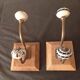 Duo of coat hooks, coat racks in wood and bronze porcelain