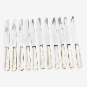 Set of 11 large silver metal knives