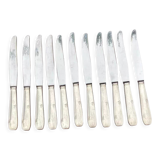 Set of 11 large silver metal knives