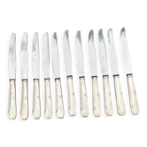 Set of 11 large silver metal knives