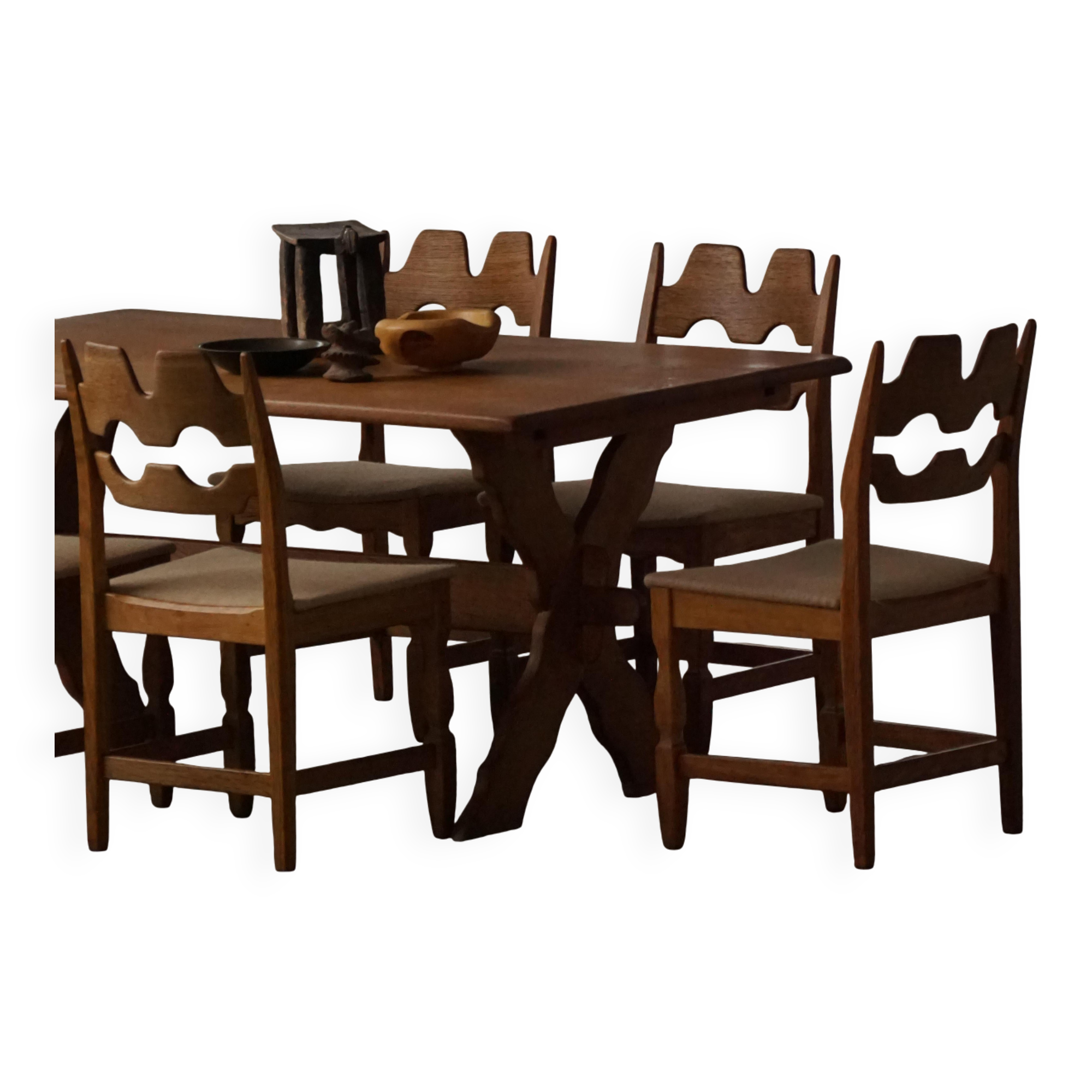 Solid oak dining table with cross base by Danish cabinetmaker, mid-20th century.