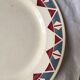 Six dinner plates don't match in red and blue