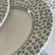 4 English dinner plates.