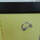 Vintage laundry basket in yellow and black plastic