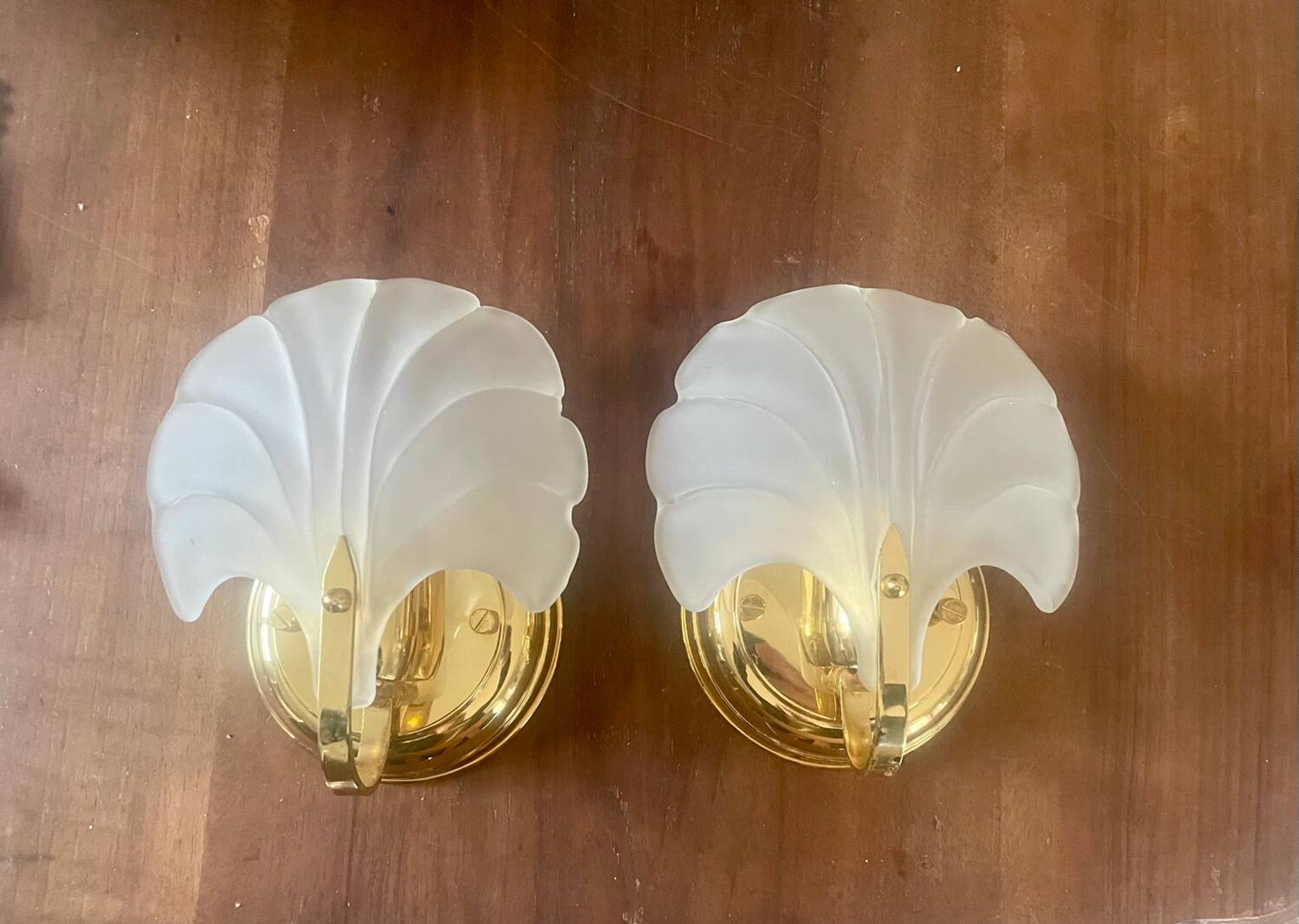 Pair of vintage polished glass shell sconces
