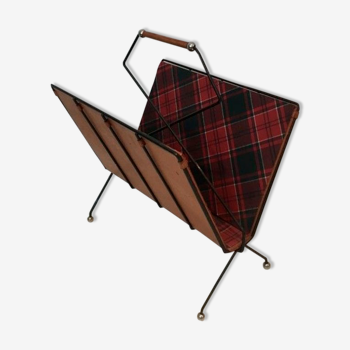 Black lacquered metal magazine racks, leather and checkered fabrics