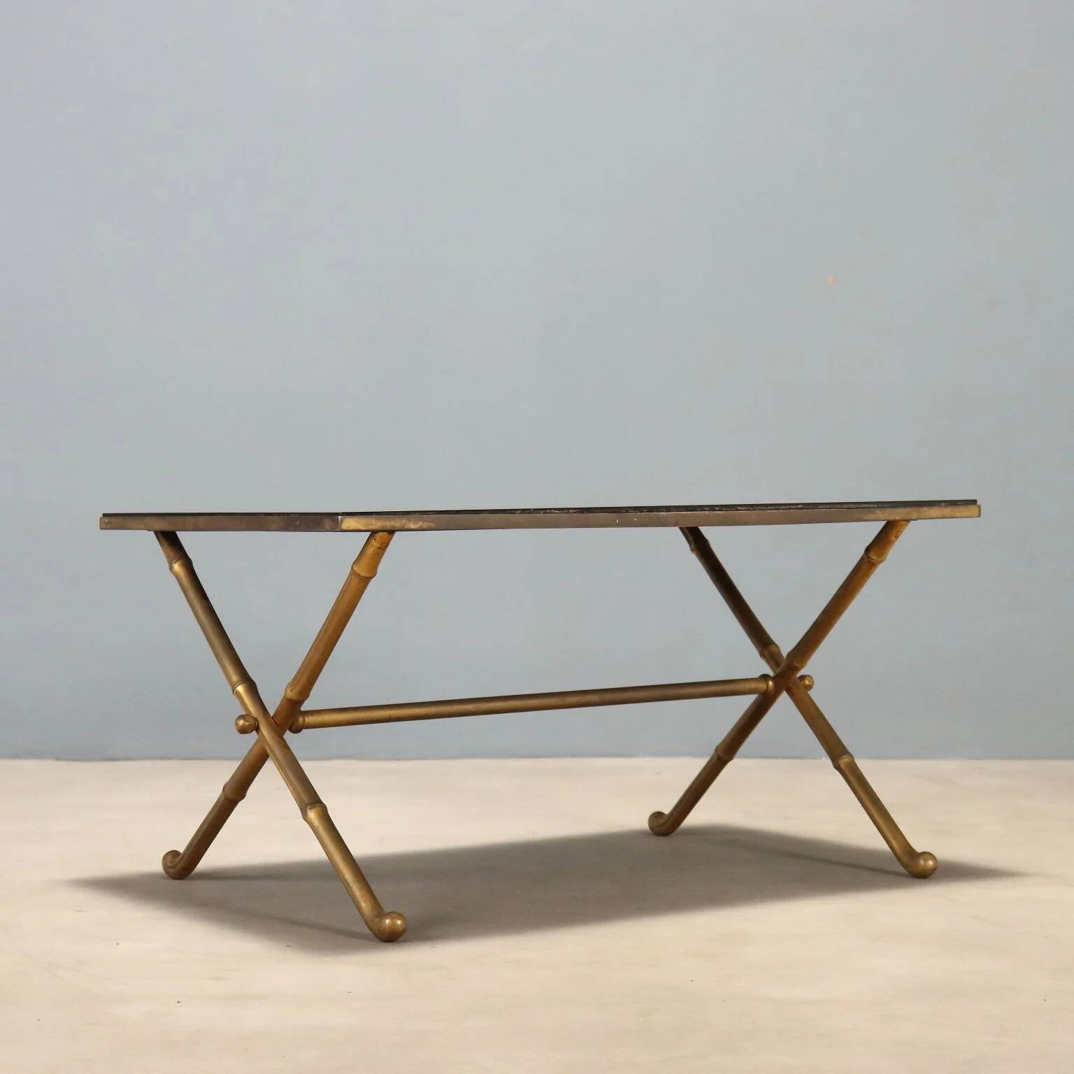 Coffee table from the 1950s-60s with a brass base.