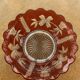 Red and transparent glass bowl with floral motifs and vintage wheat cobs
