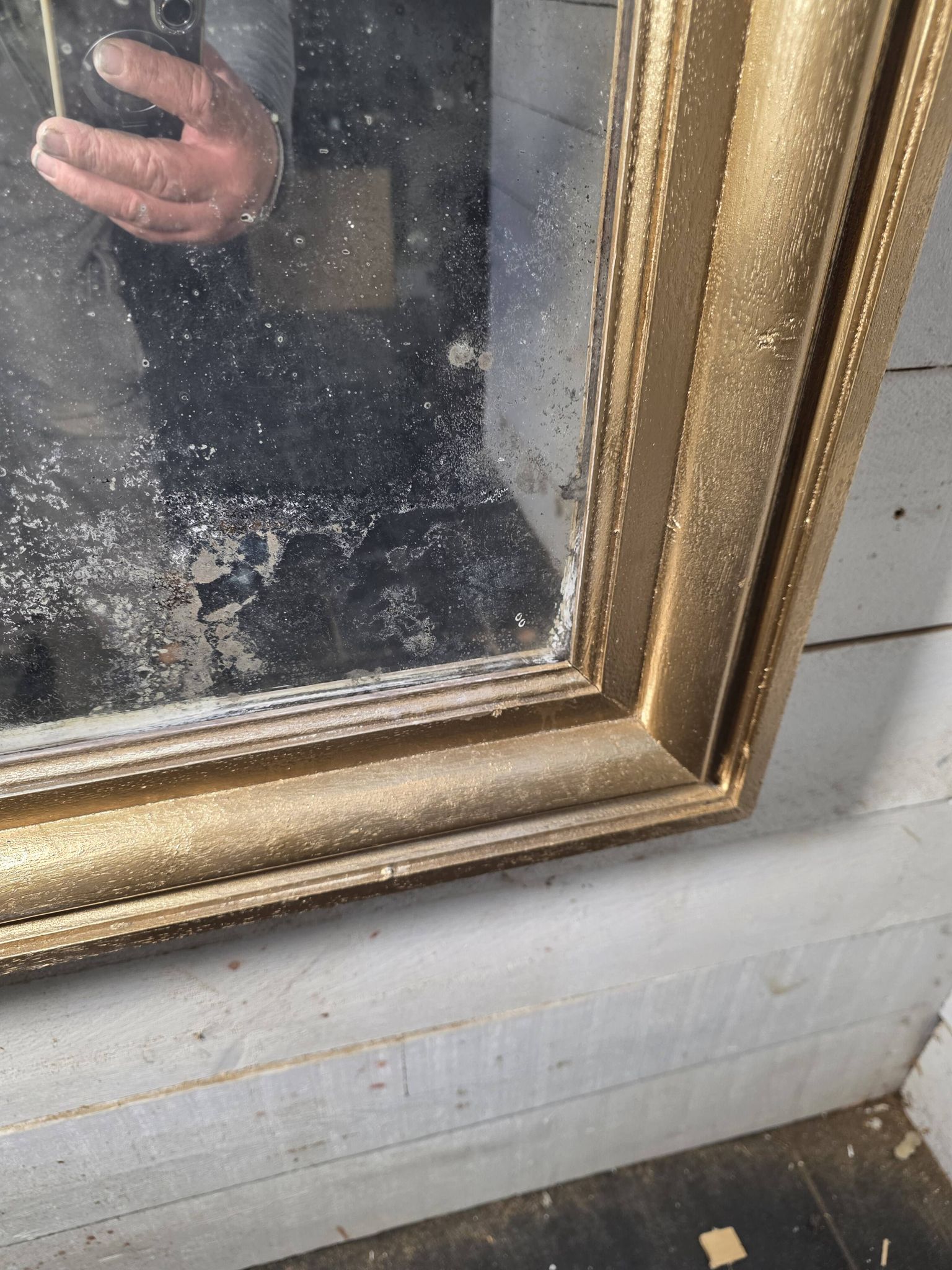 Golden mirror in oak from the 19th century.