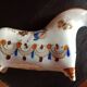 Ken edwards pottery - stylized horse decorated with butterfly flowers bird
