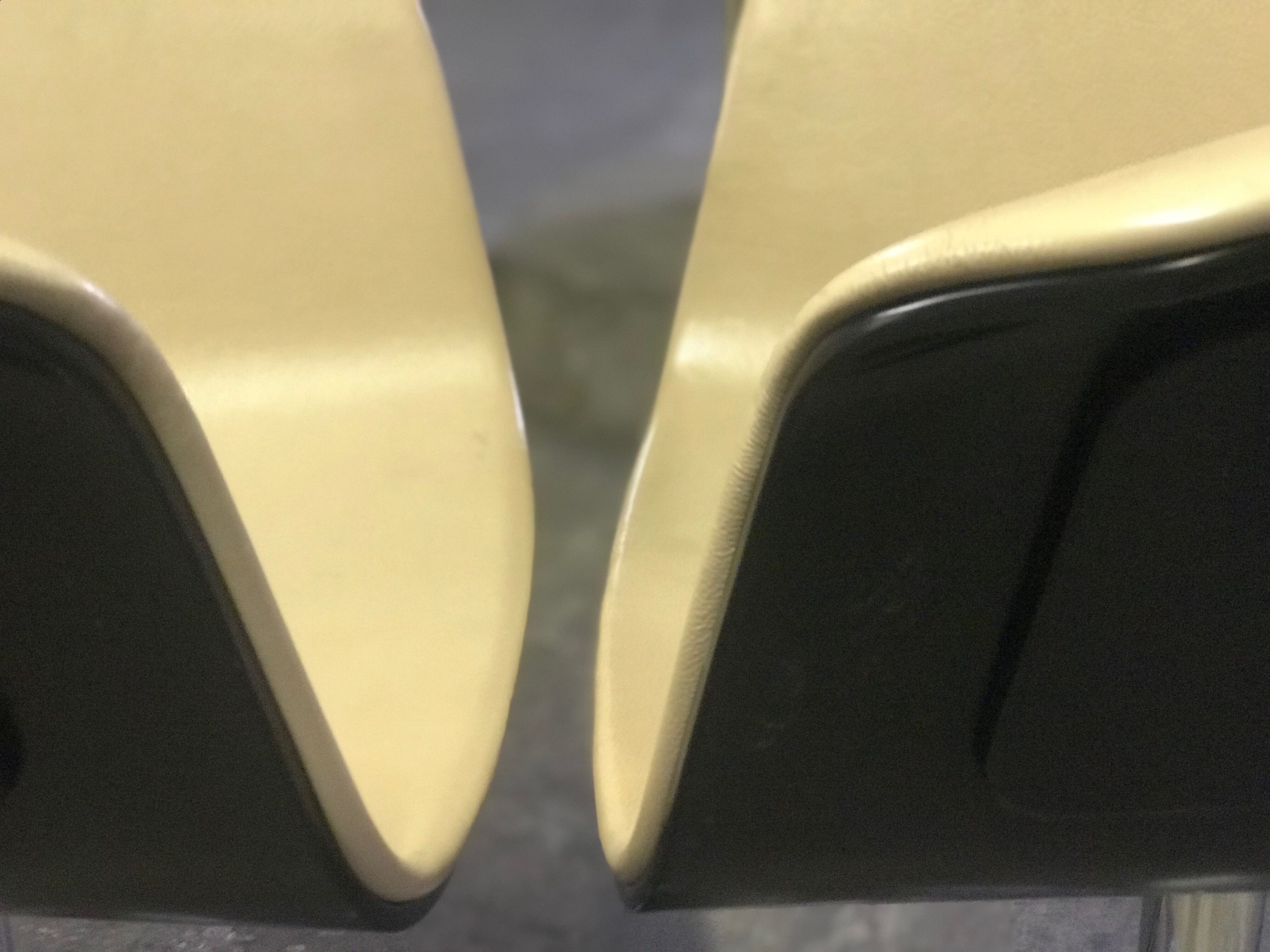 Pair of beige leather armchairs