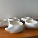 Teapot and cups in contemporary ceramic