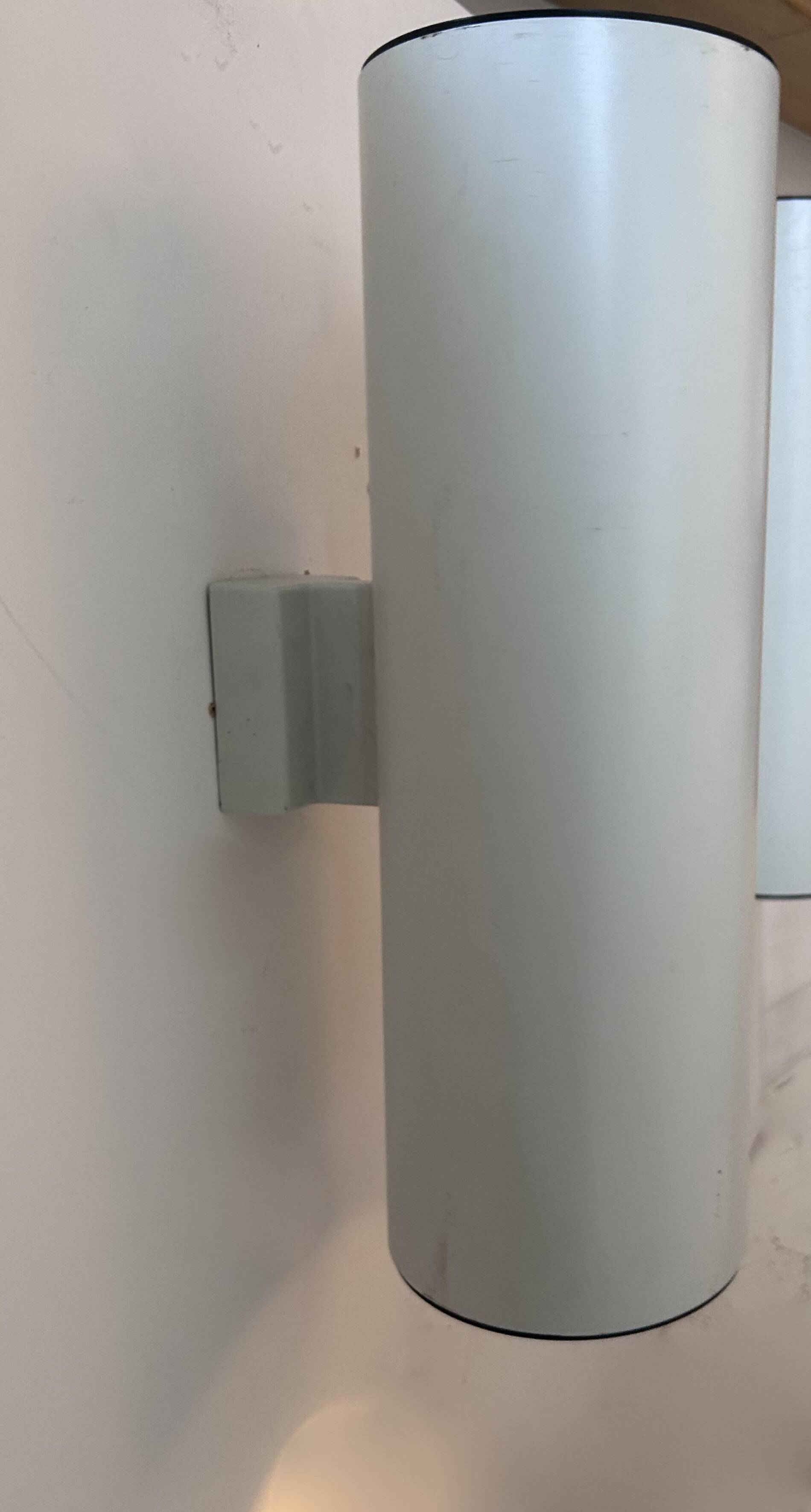 Pair of vintage cylindrical wall lights, matt white metal, Germany Erco 1976