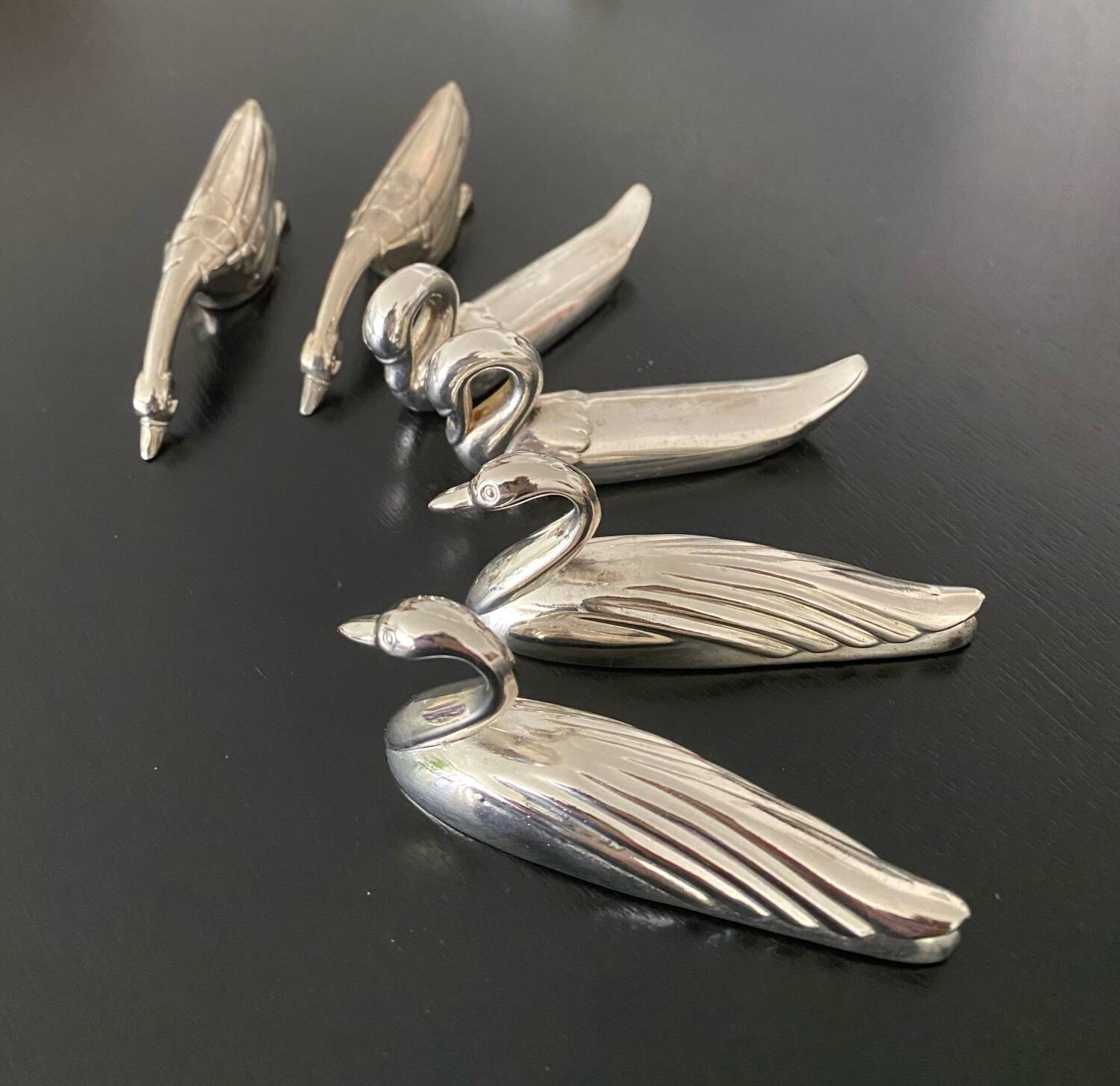 6 various animal knife holders in silver-colored metal
