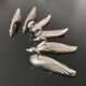 6 various animal knife holders in silver-colored metal