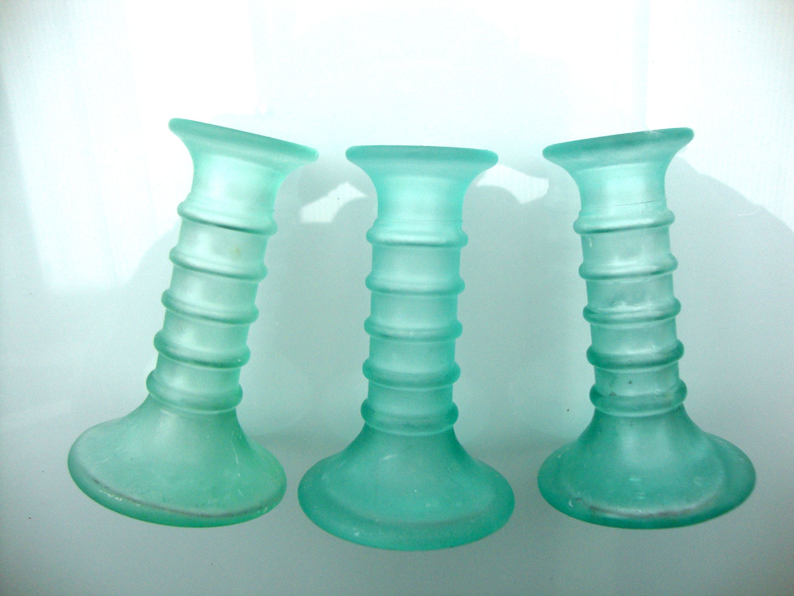 3 twisted glass candlesticks