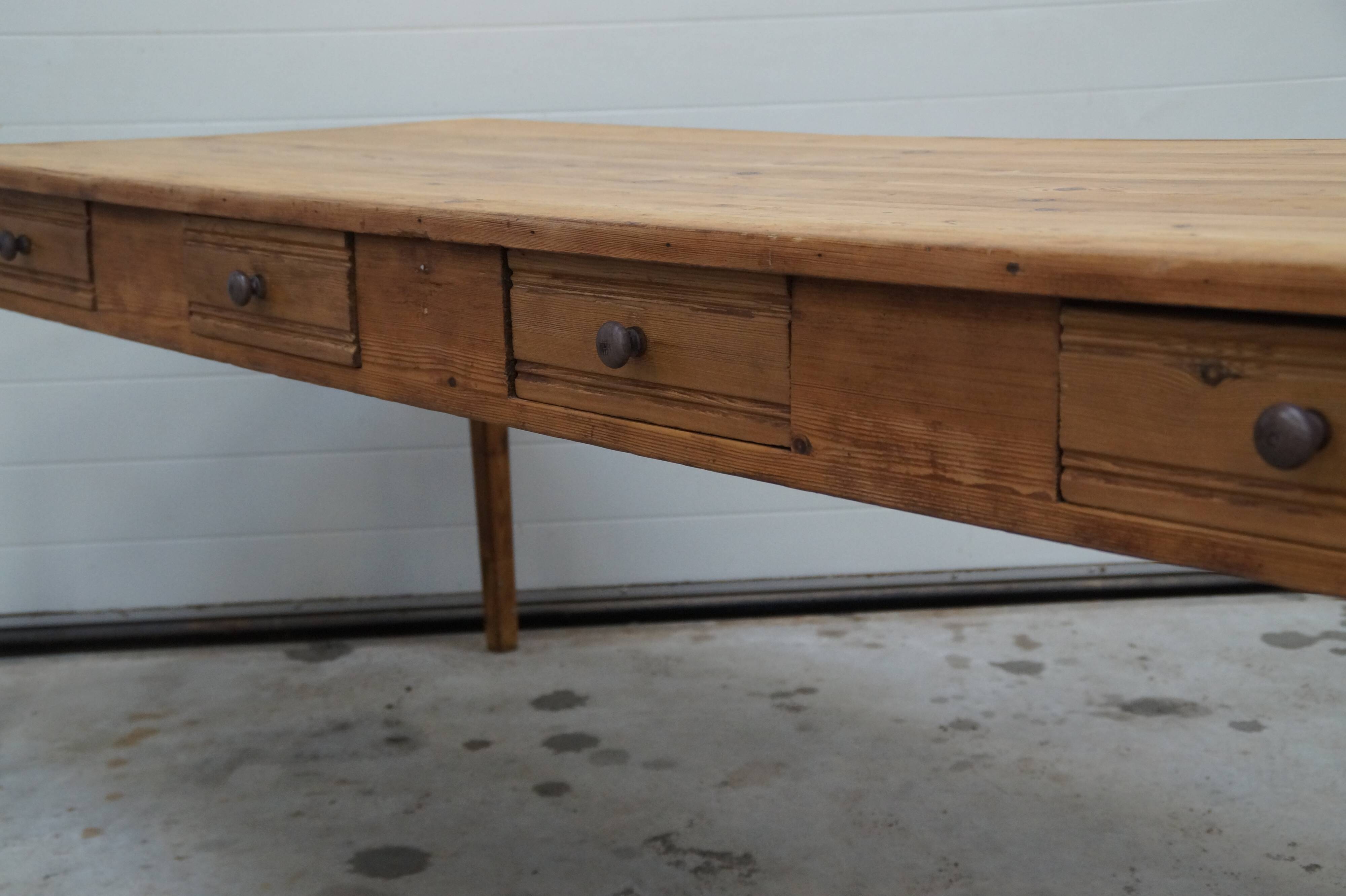 Old canteen in pine table