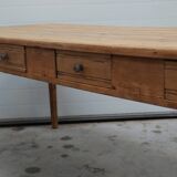 Old canteen in pine table