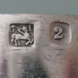Old Round of plain silver metal towel