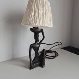 Ebony lamp with seated woman / 1930s