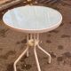 Round bistro table in steel with tulip base and glass top, 60cm