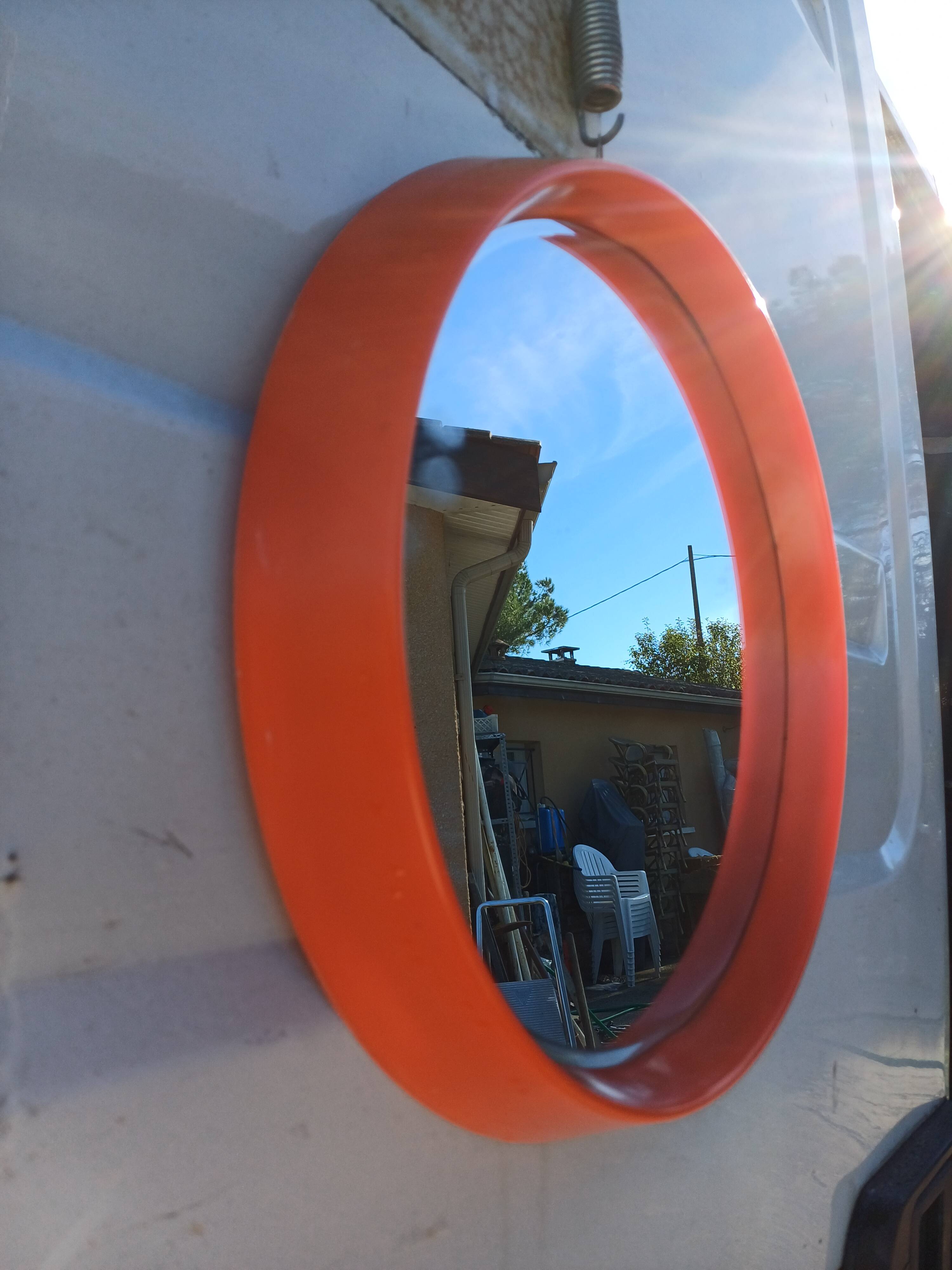 Vintage round plastic orange mirror