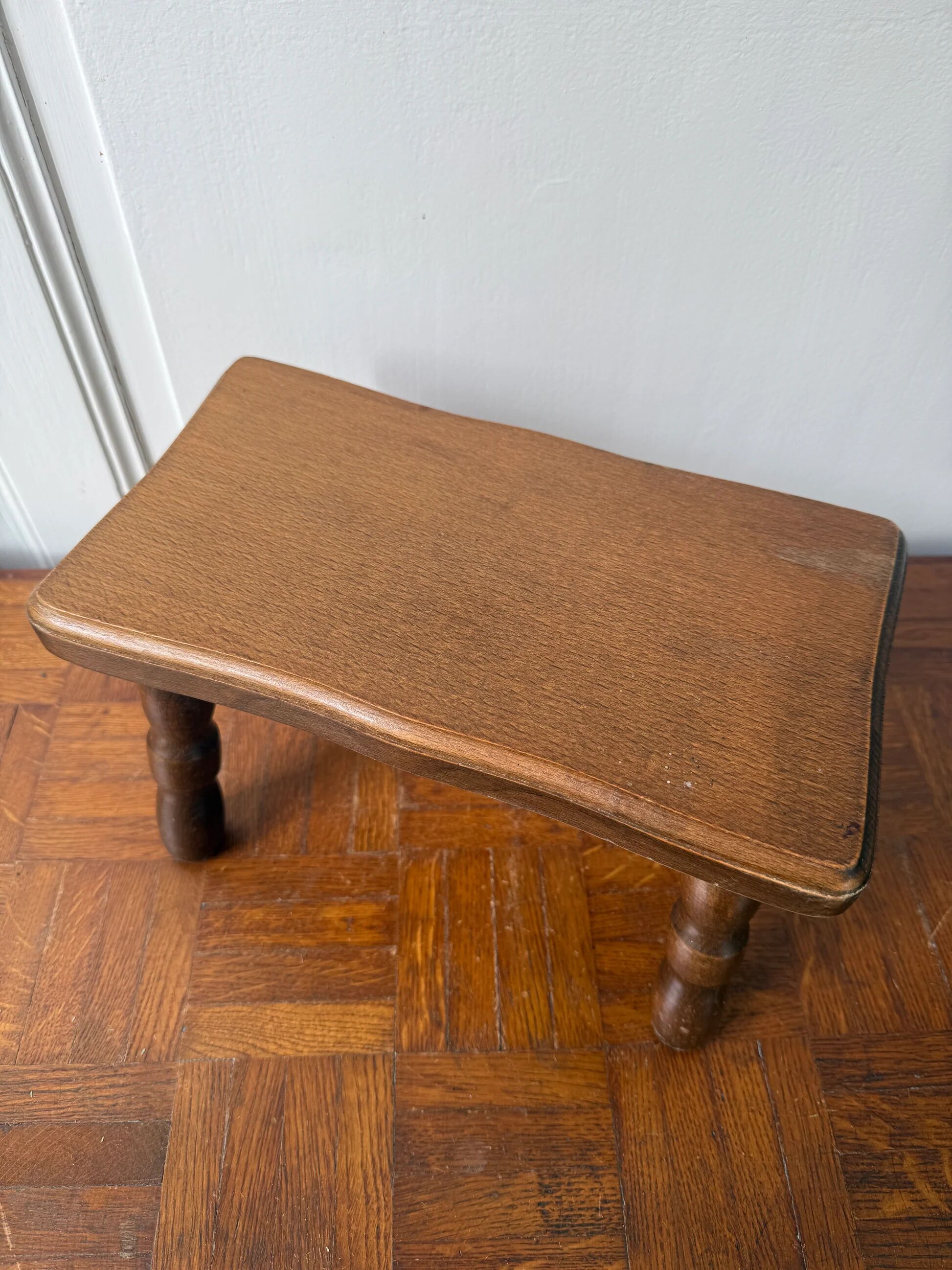 Old wooden milking stool