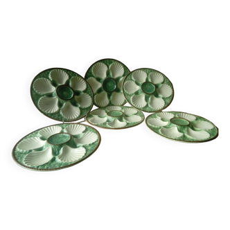 Oyster plates in onnaing barbotine or other earthenware