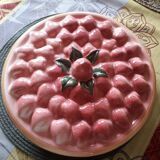 Glazed ceramic dessert plate with strawberry design.