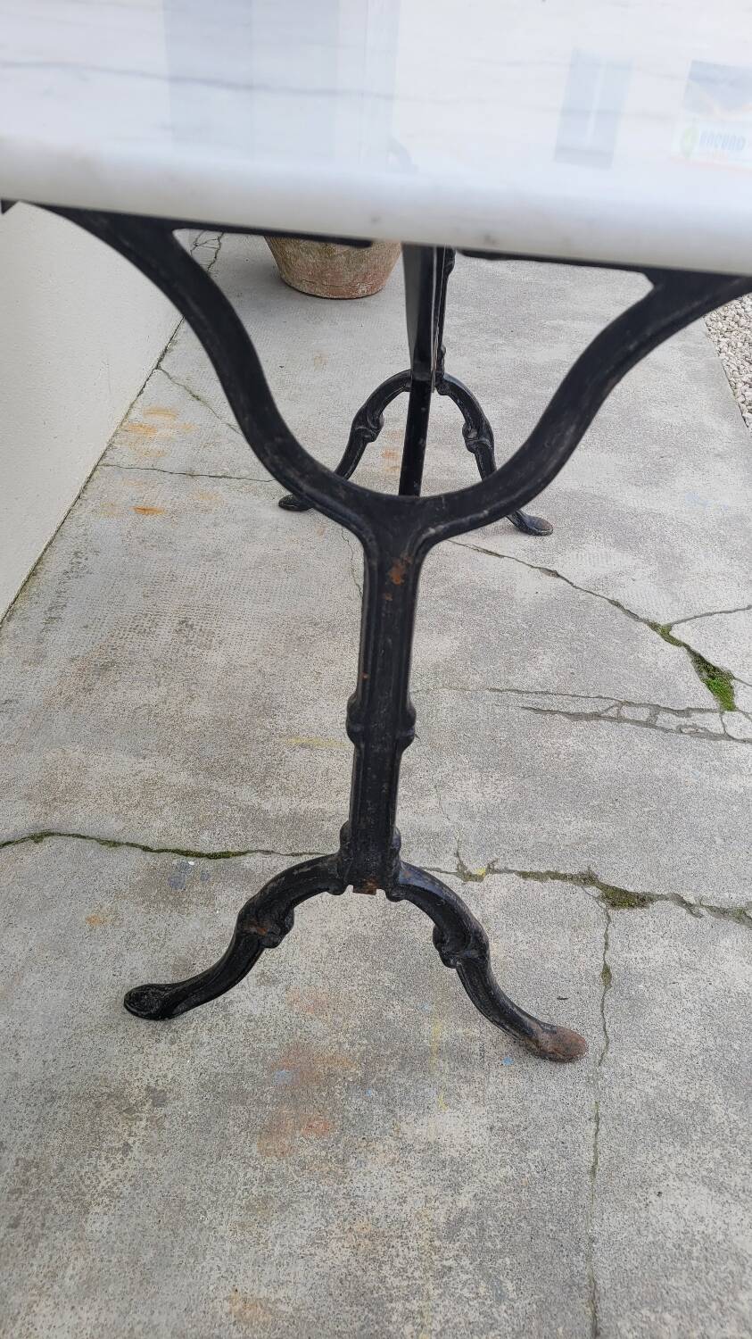Marble and antique cast iron bistro table