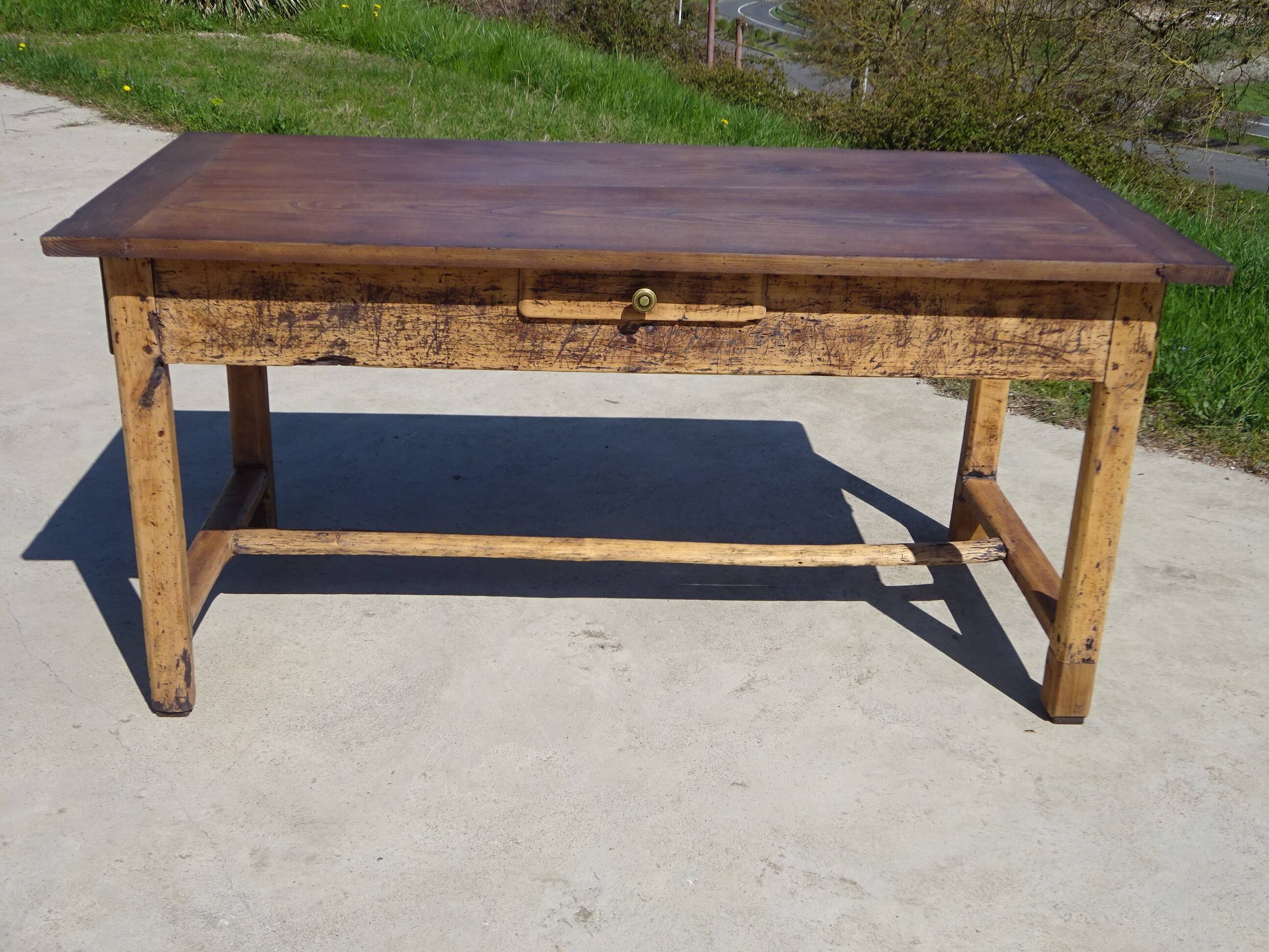 Old farmhouse table made entirely of restored solid oak.
