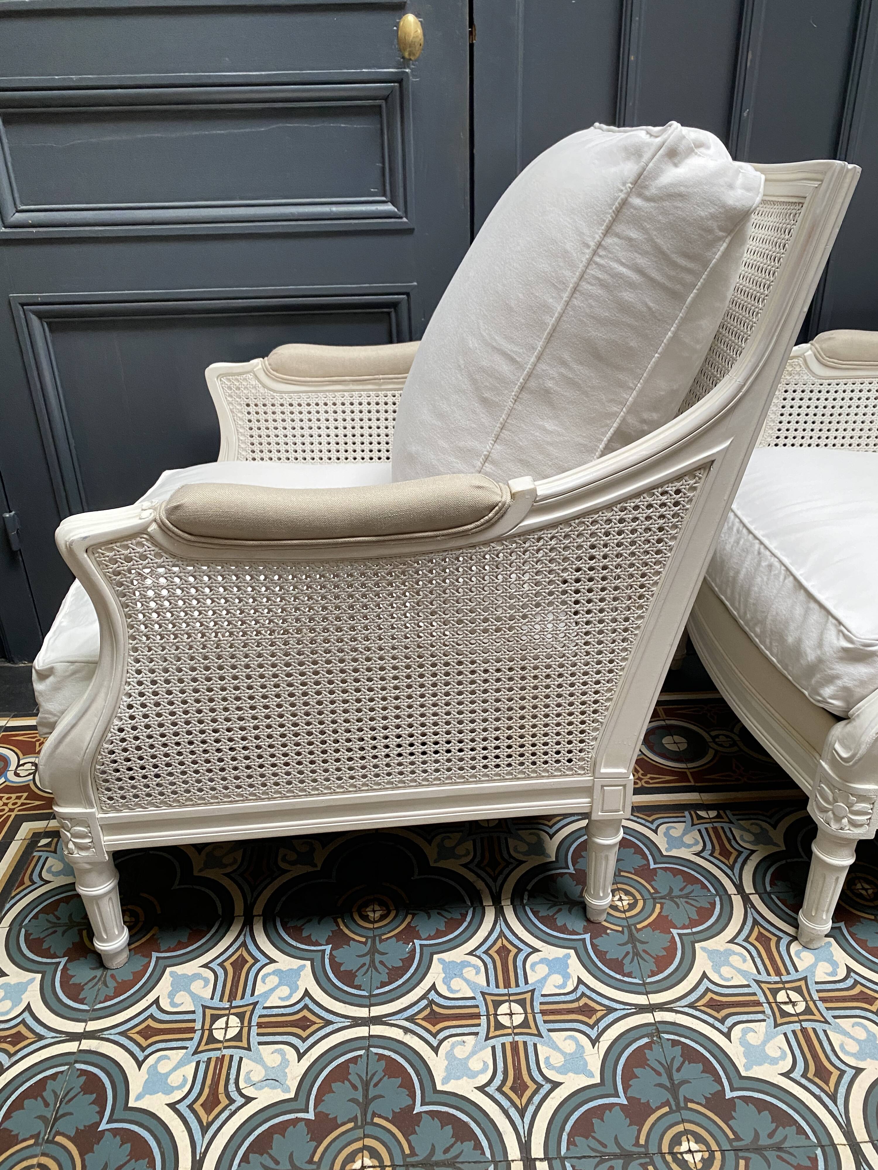 Pair of Louis XVI style caned Bergère armchairs