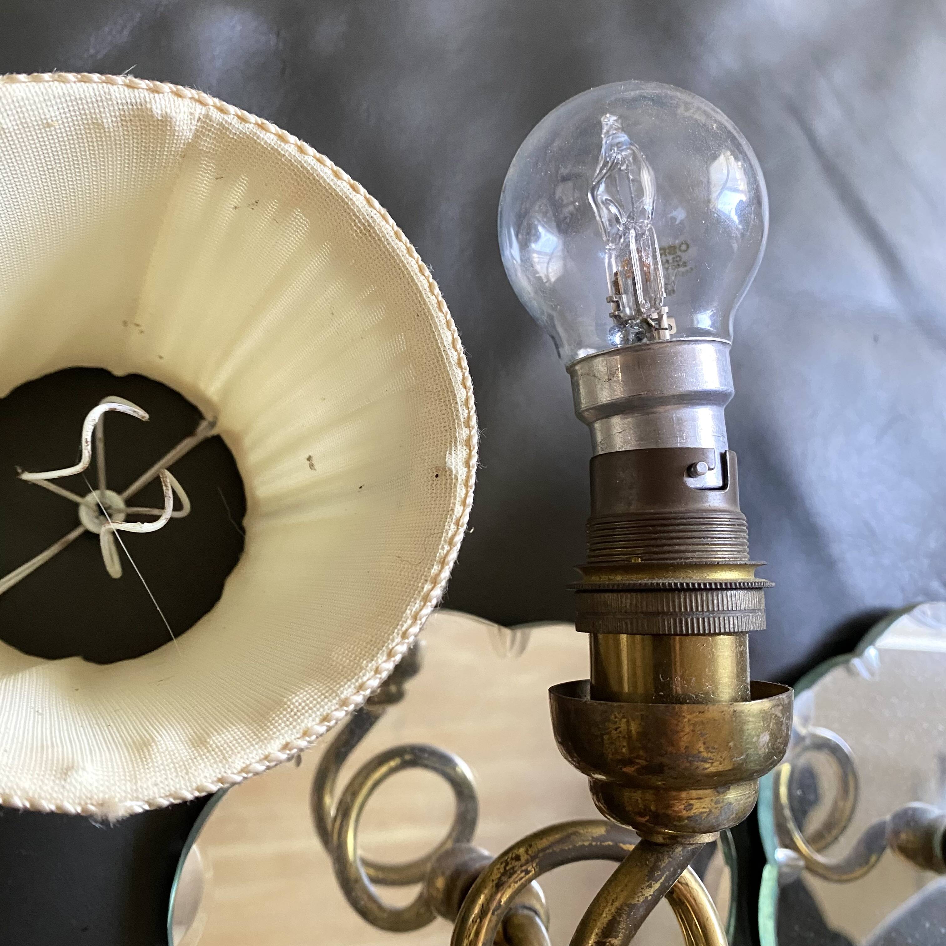 Pair of mirror and brass wall lights from the 50s and 60s