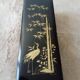Glove box in lacquered wood decorated with a crane among bamboos. China, Japan?