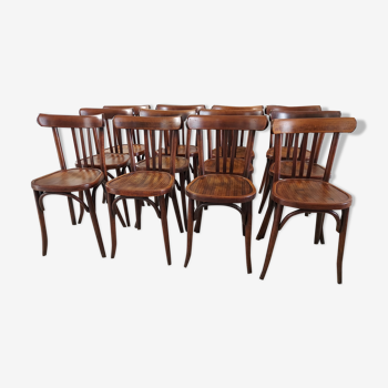 Suite of 12 chairs of bistrot Baumann 1940s