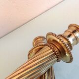 Pair of empire style brass candlesticks