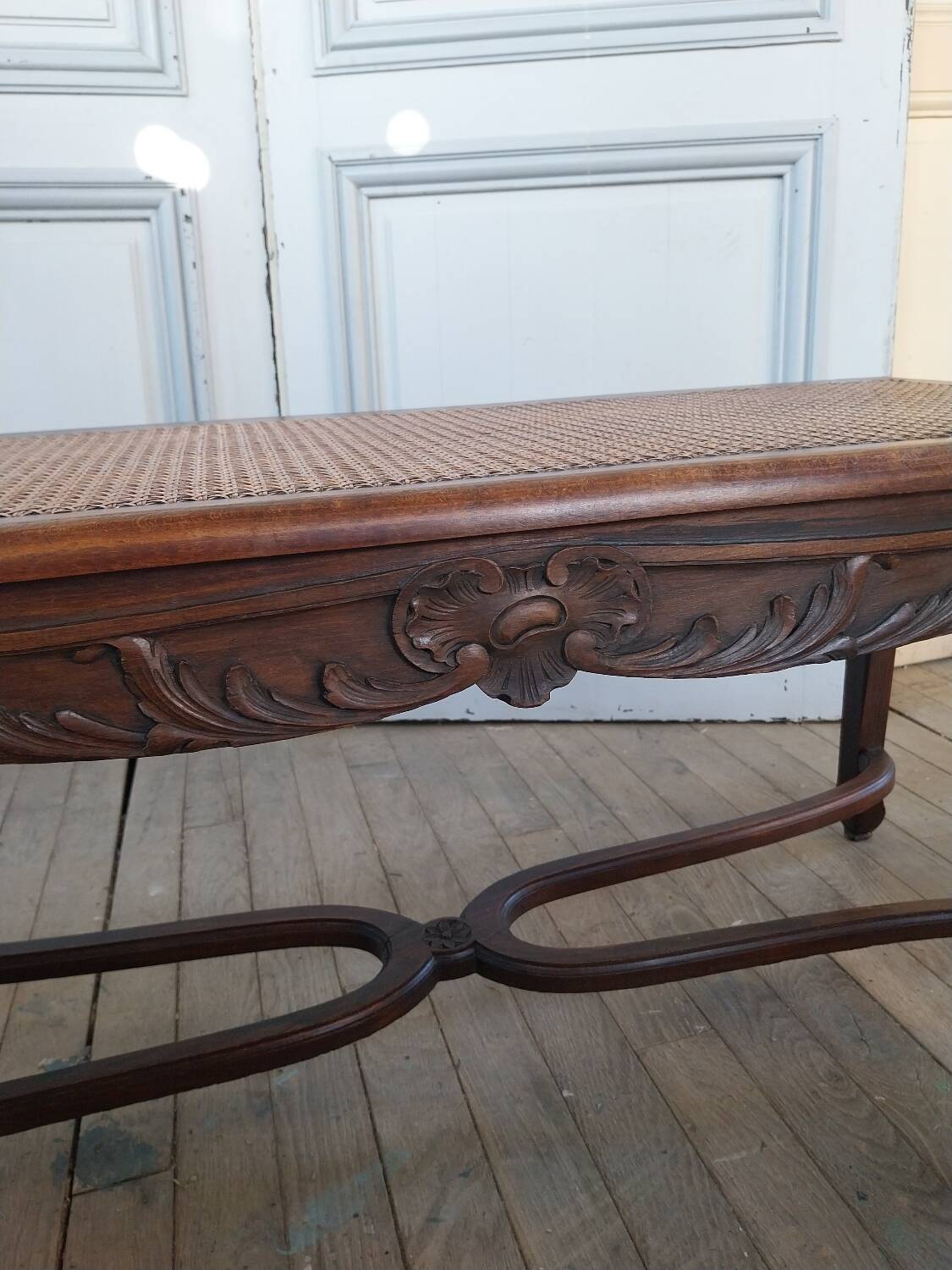 Louis XV style bench with cross-braced design