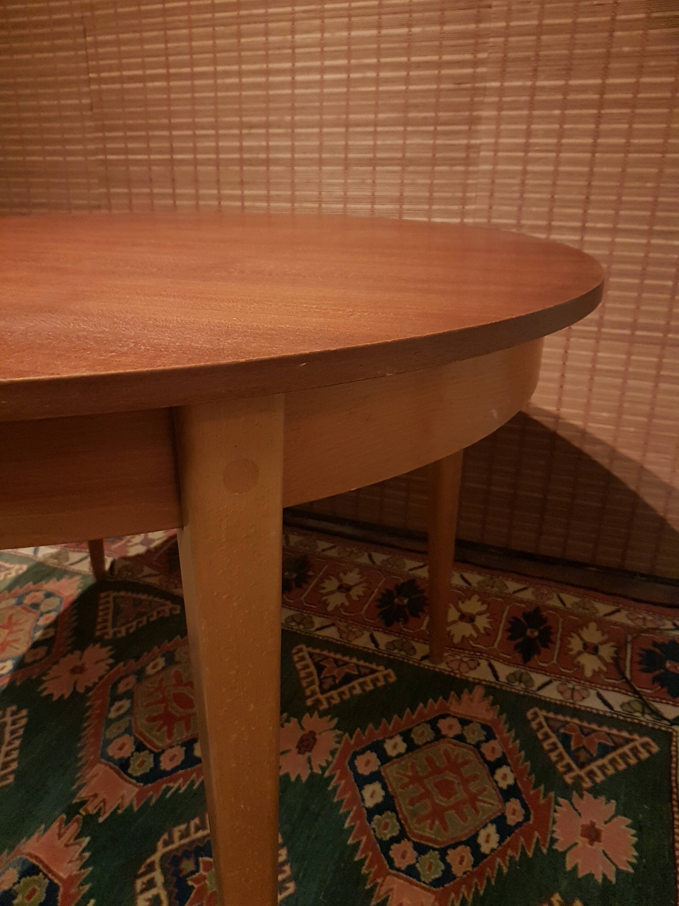 Scandinavian round extending table.