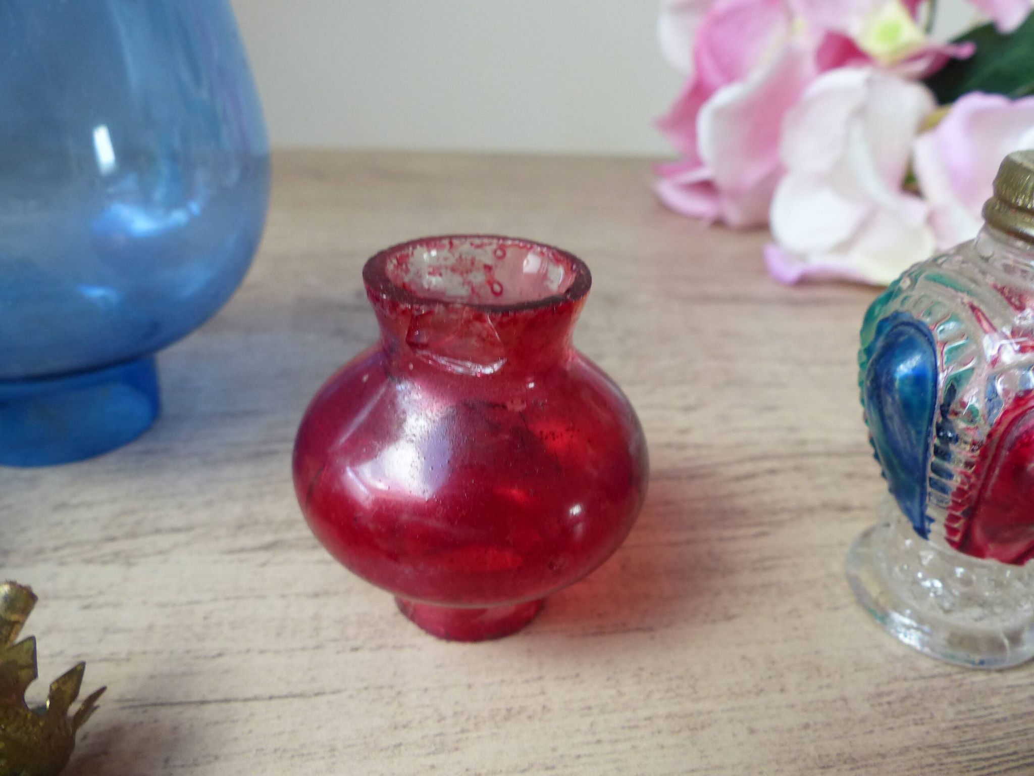 Set of two old coloured glass oil lamps Hong Kong.