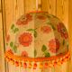 Vintage lampshade suspension with orange flower and ponpons