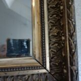 Antique wooden and gilded stucco mirror